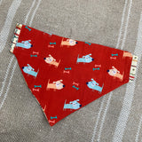 Red Dog Bandana - reversible, handmade from cotton featuring cartoon dogs on a red background